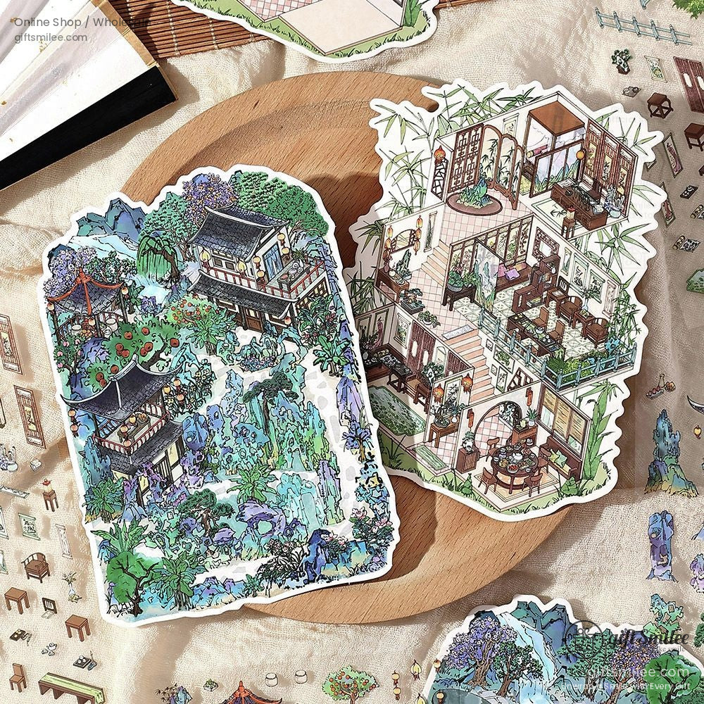 Intricate handmade sticker featuring a Japanese-style garden scene with lush greenery and traditional architecture.
