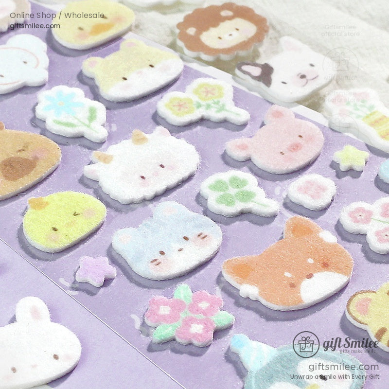 Close-up of colorful, soft felt puffy stickers showcasing adorable fox, cat, and flower designs