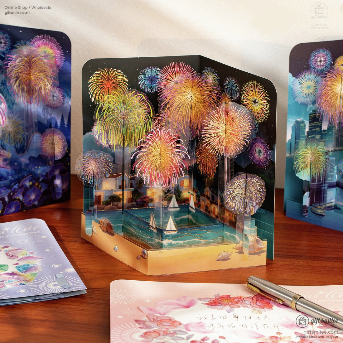 Multilayered popup cards with vibrant fireworks in pastel shades illuminating cityscapes beaches and ferris wheels