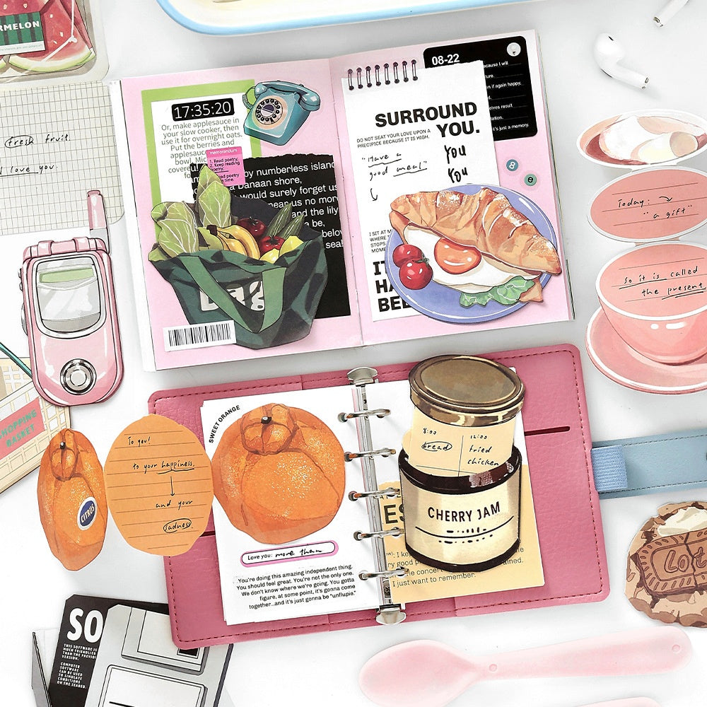 Assorted paper cutouts of colorful food items drinks and household objects including ice cream cookies and a milk cup