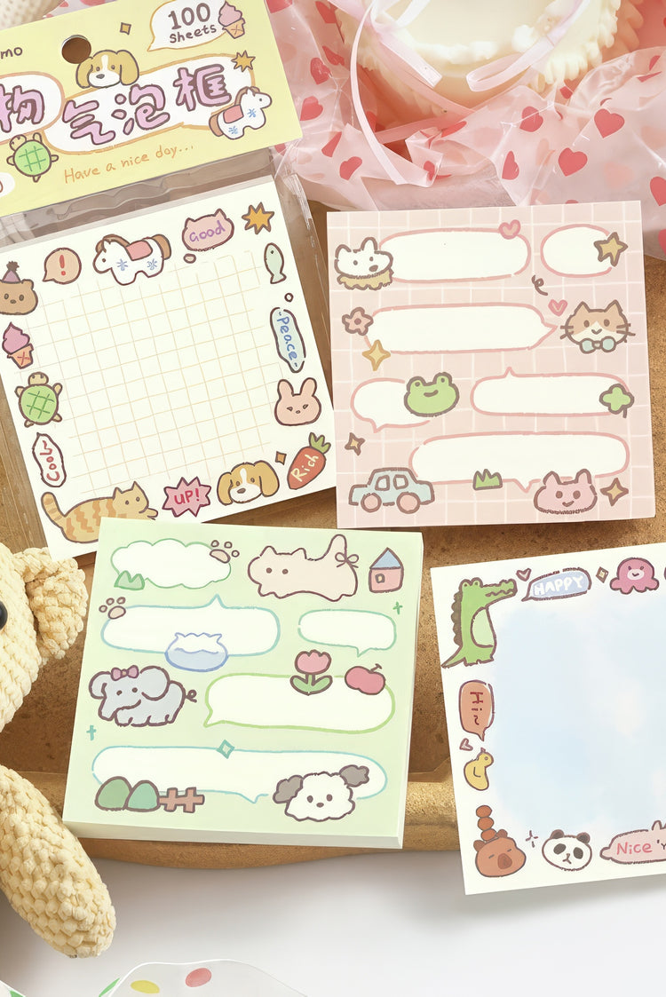 Cute pastel sticky notes with animal designs including cats frogs pandas and dinosaurs on pink green and white backgrounds