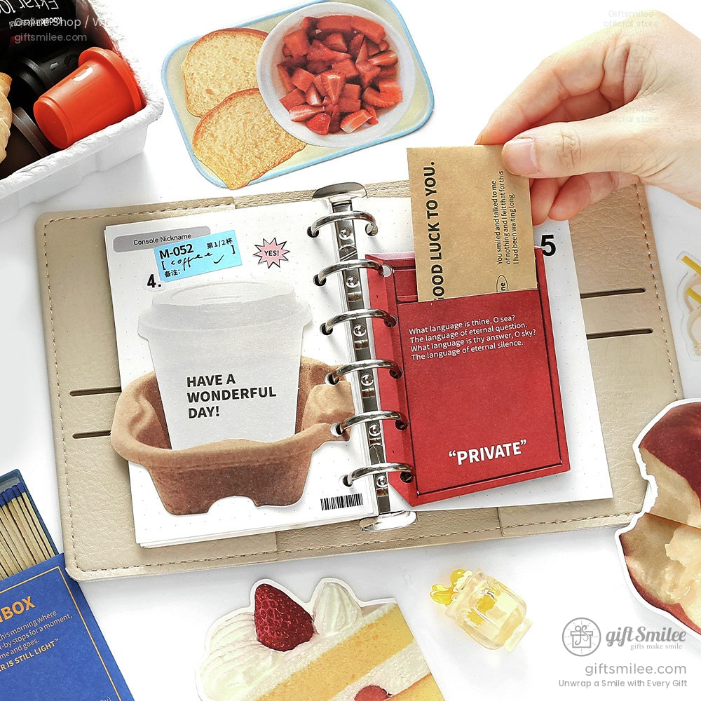 Beige leather planner with a red pocket insert coffeethemed stickers and vibrant paper cutouts of breakfast items