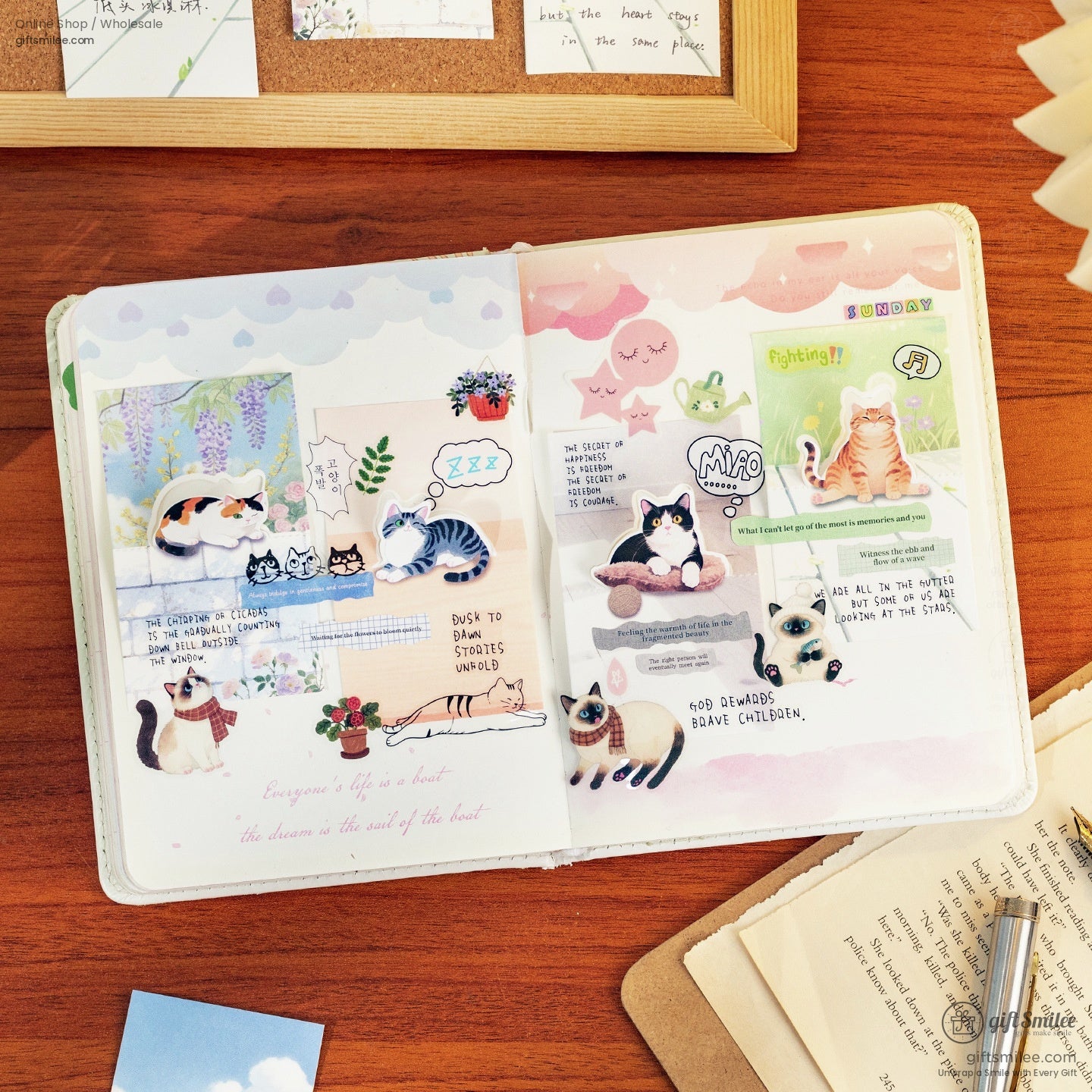 Open scrapbook with whimsical catthemed stickers pastel illustrations handwritten notes and colorful designs on a wooden desk