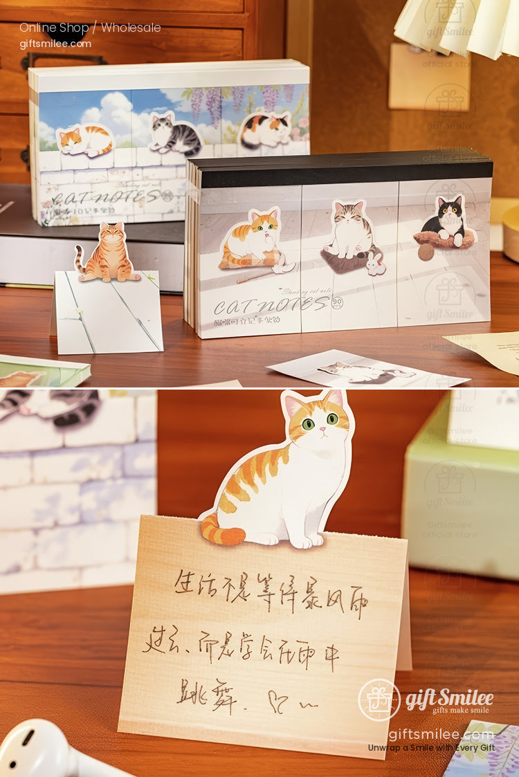 Catthemed stationery set with colorful illustrated notepads memo holders and vibrant feline designs on a wooden desk