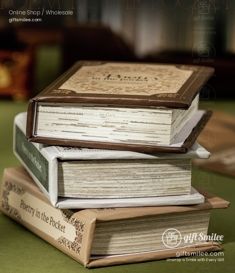 Stack of vintage hardcover books with ornate brown green and beige covers on a green table surface