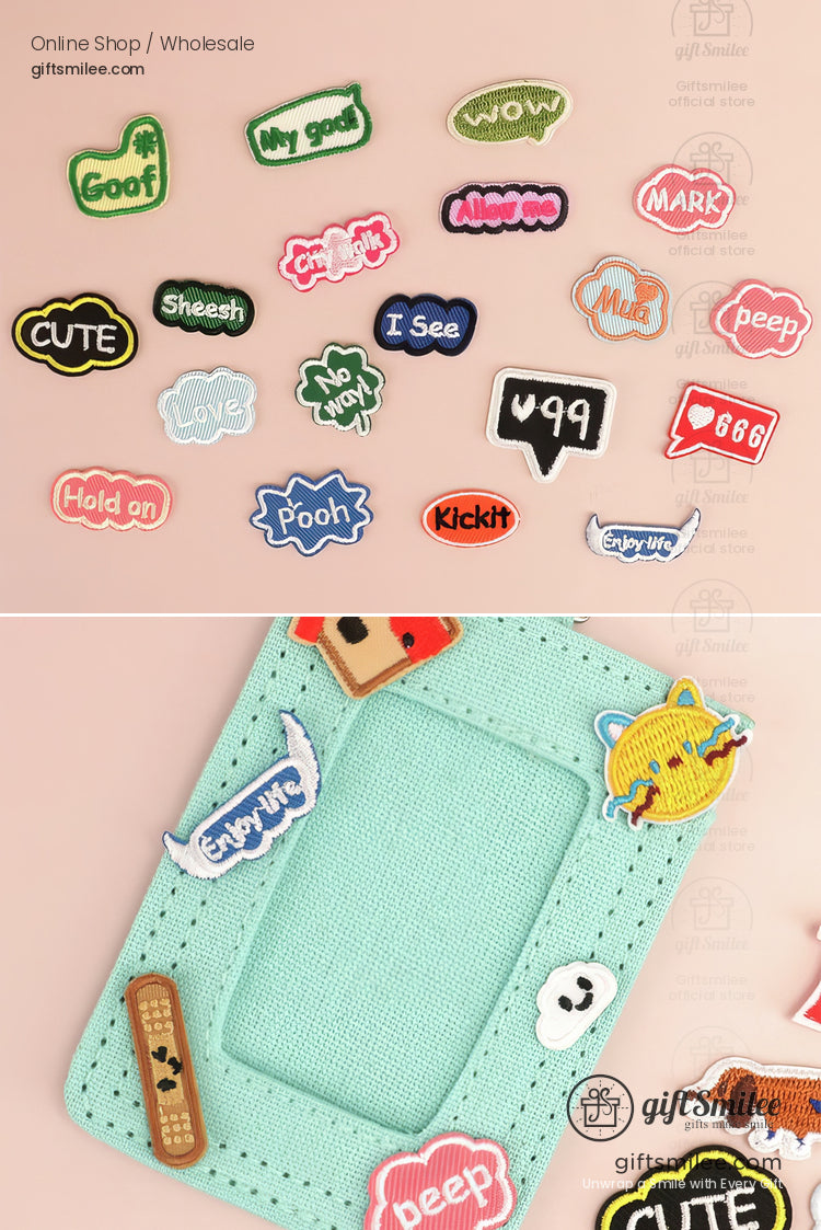 Colorful embroidered ironon patches with playful phrases and cute designs displayed on a pastel pink background
