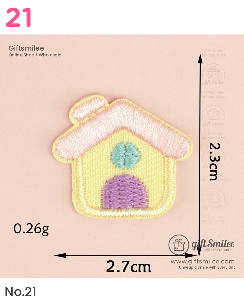 Yellow embroidered house patch with pink roof purple door blue window and precise dimensions of 27x23 cm