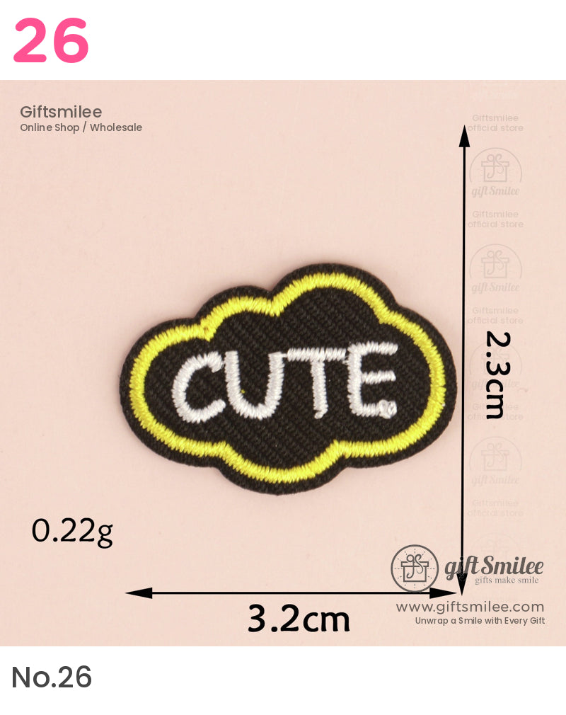 Black embroidered cloud patch with yellow border and white CUTE text measuring 32cm by 23cm
