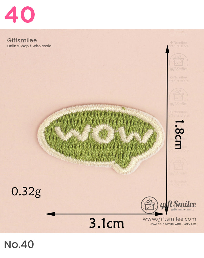 Green embroidered patch with white wow text in a speech bubble shape outlined in white measuring 31cm x 18cm