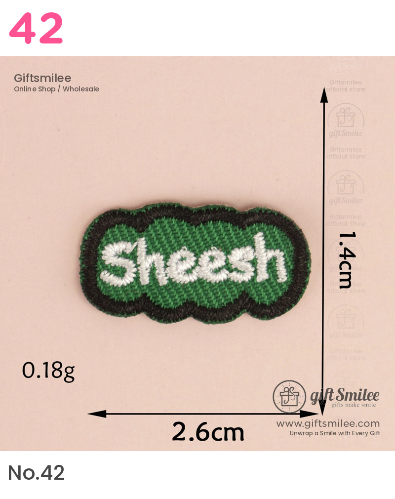 Green embroidered patch with white Sheesh text black border lightweight at 018g measuring 26cm x 14cm
