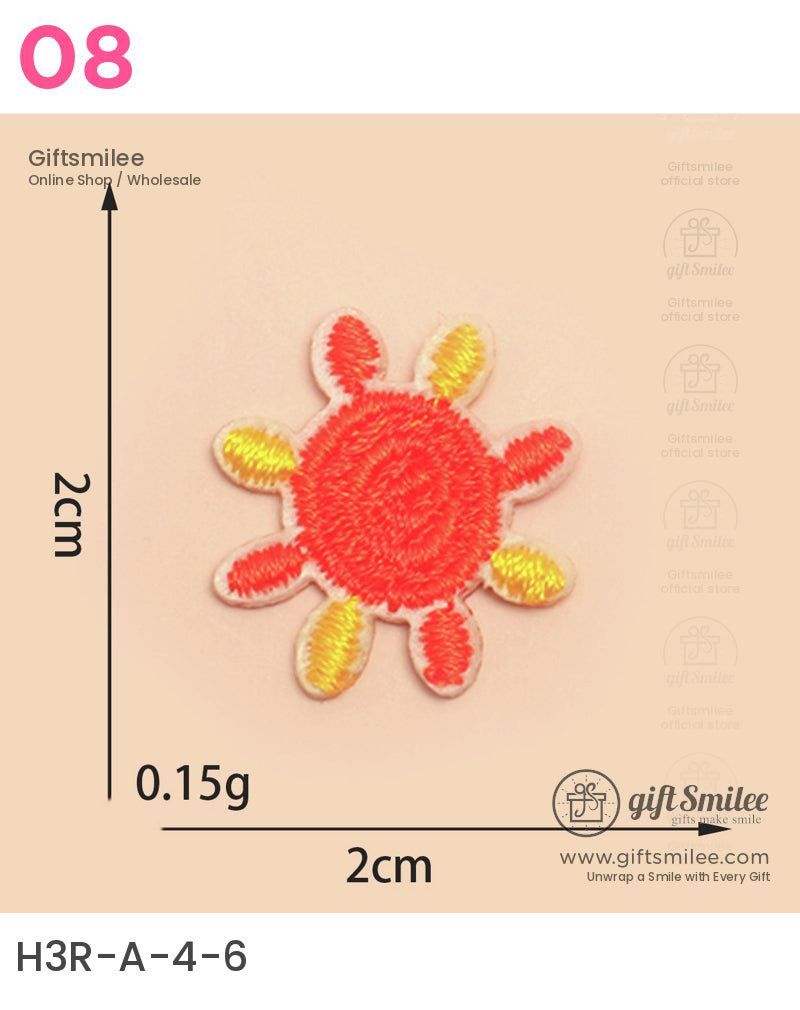 Small embroidered patch in a vibrant red sun design with yellow rays 2cm size lightweight at 015g