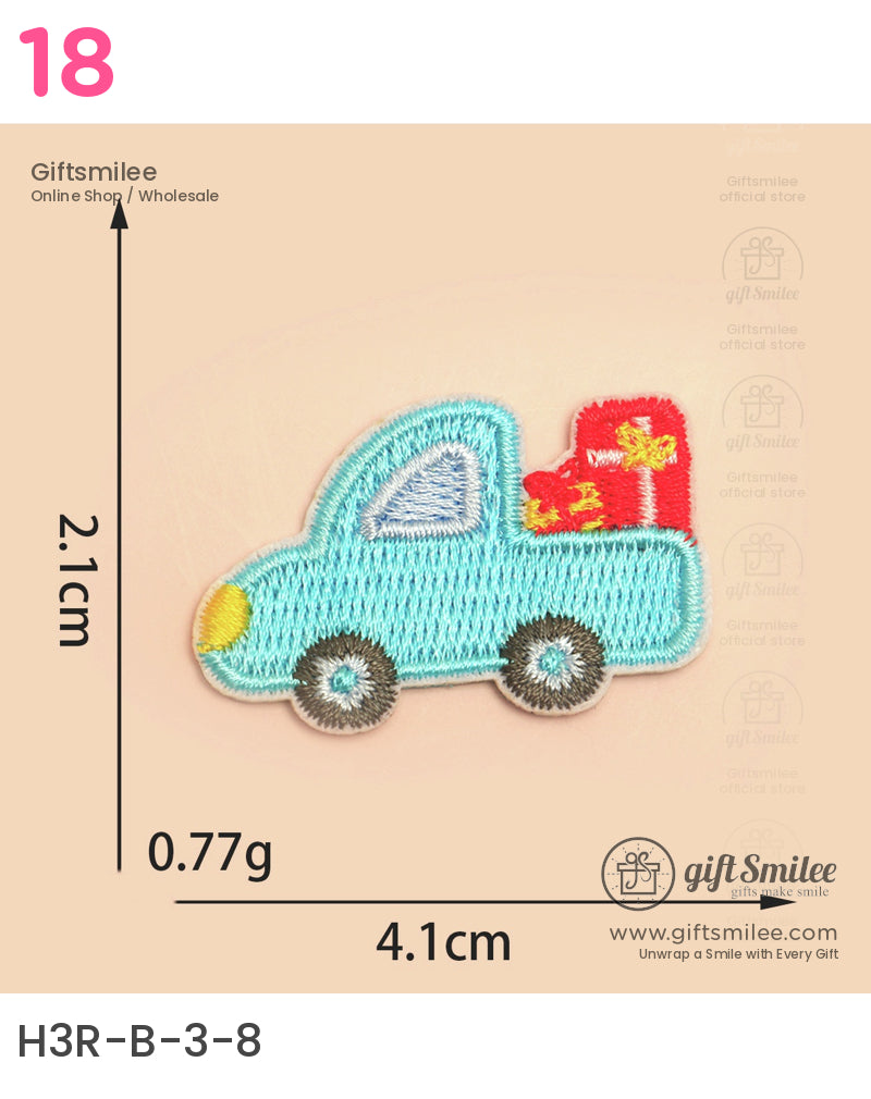 Light blue embroidered truck patch with yellow headlight red gift detail and gray wheels measuring 41cm x 21cm