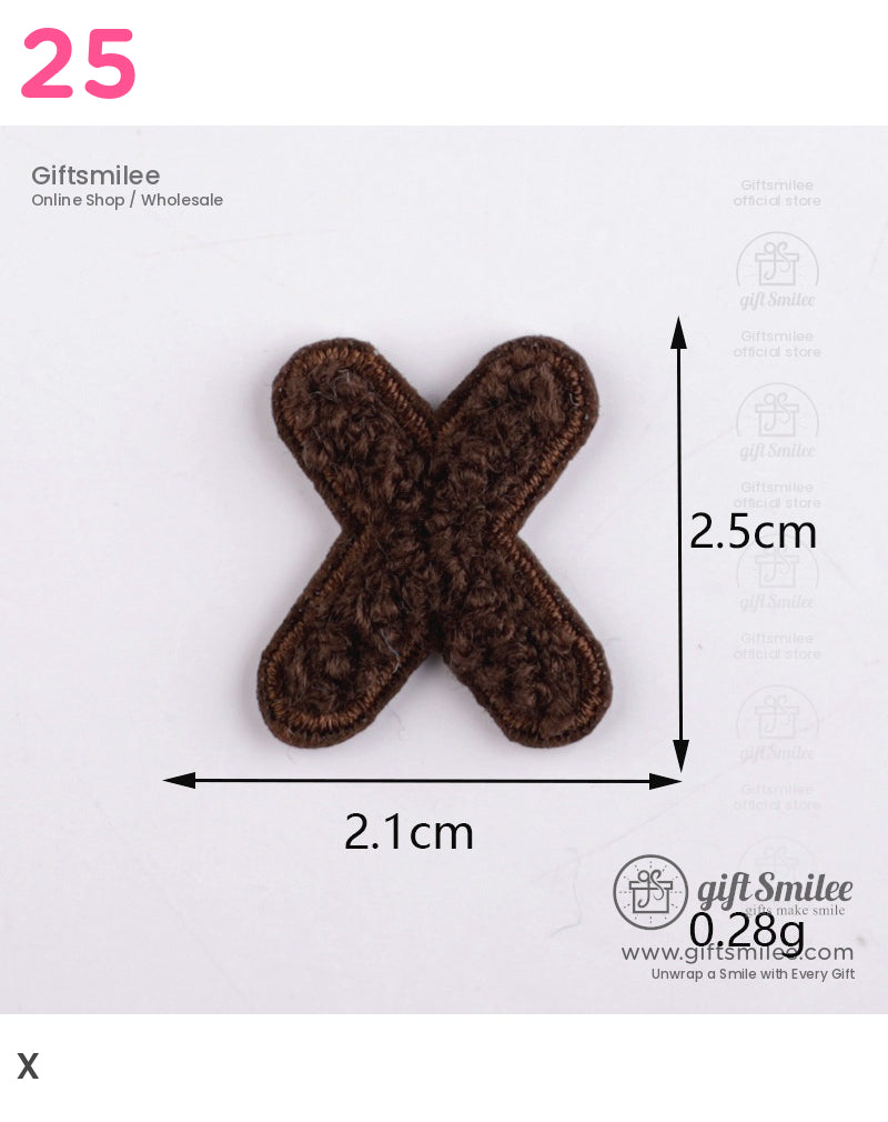 Small brown embroidered X patch with textured fabric 25 cm height 21 cm width lightweight at 028 g