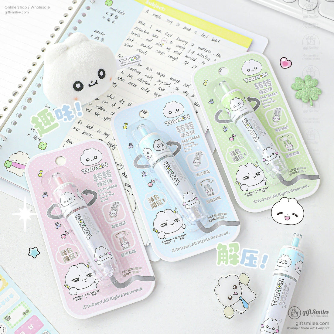 Rotating correction tape with kawaii cloud design in pastel colors, green, pink, and blue variant
