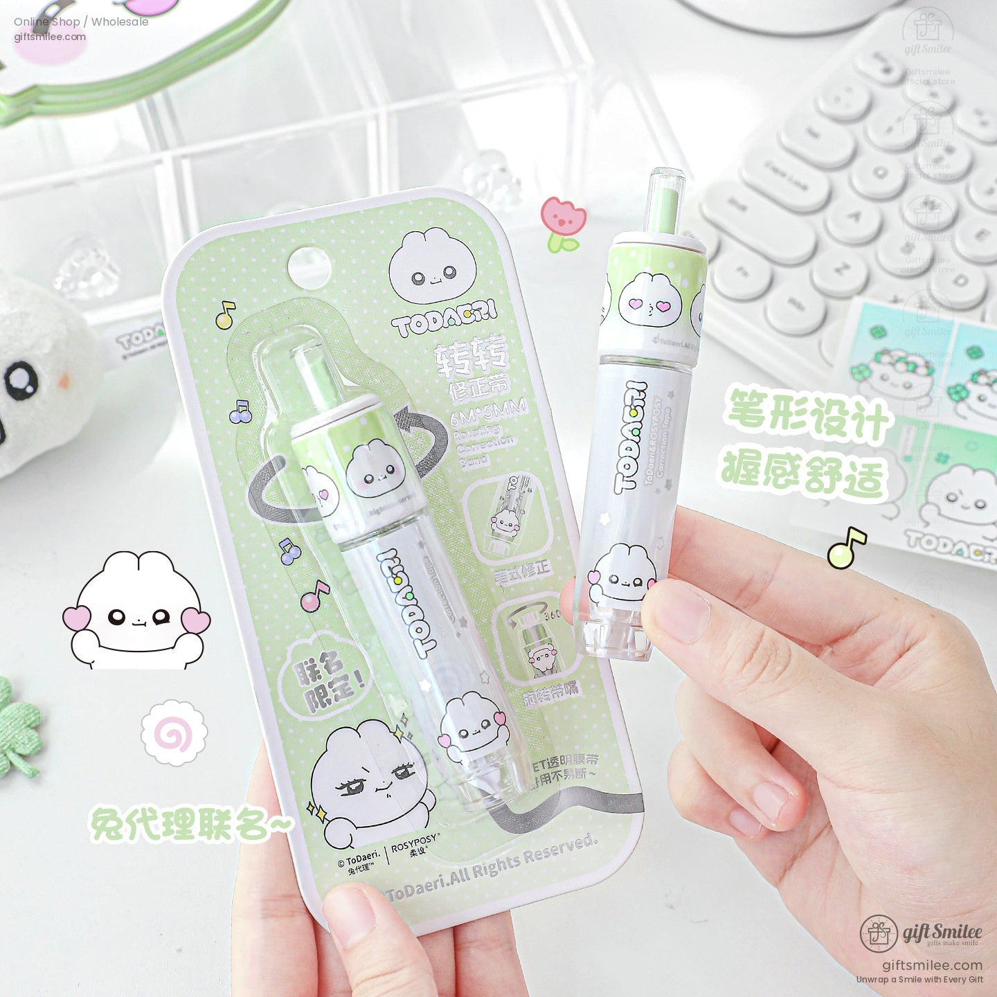 Kawaii correction tape in hand, showcasing smooth ergonomic design and pastel color tips