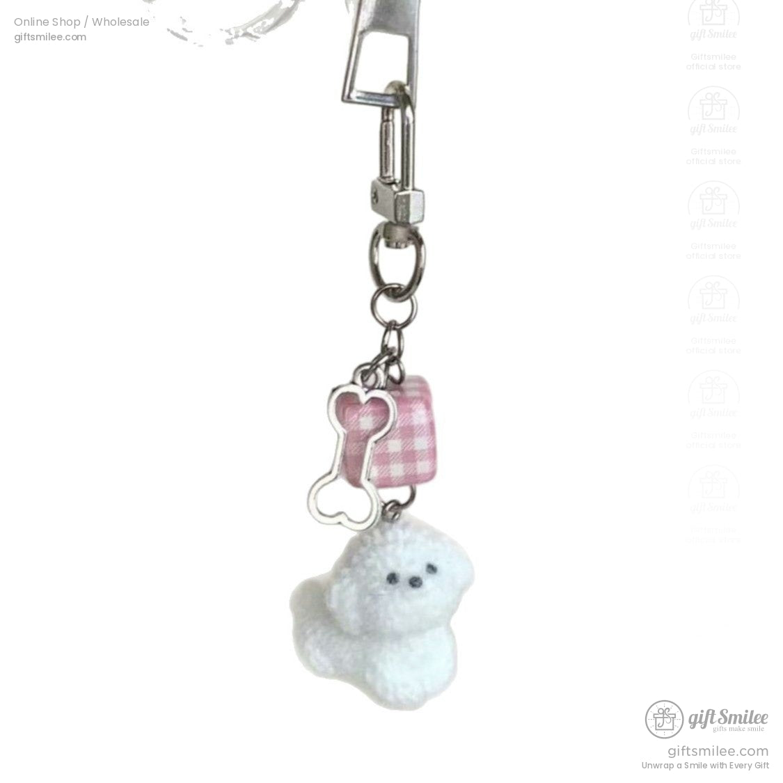 White plush dog keychain with pink gingham ribbon charm silver bone pendant and metal clip attachment