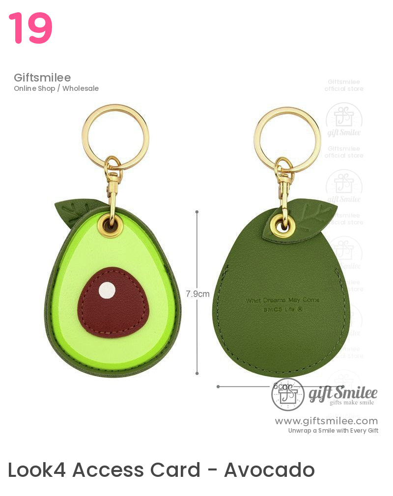 Green faux leather avocado keychain with gold ring brown seed detail leaf accent and dimensions of 79cm by 6cm