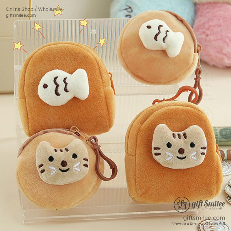 Set of tan plush coin purses with embroidered cat and fish designs soft textures round and mini backpack shapes