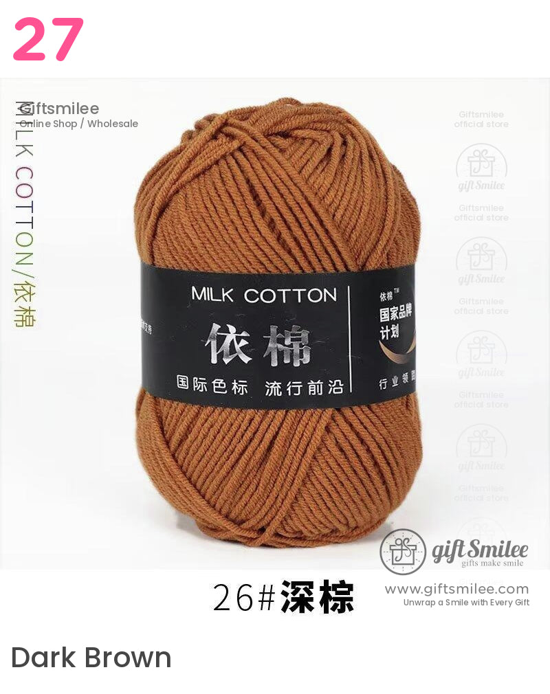 Warm brown milk cotton yarn skein with soft texture smooth strands and sleek black label for knitting or crochet