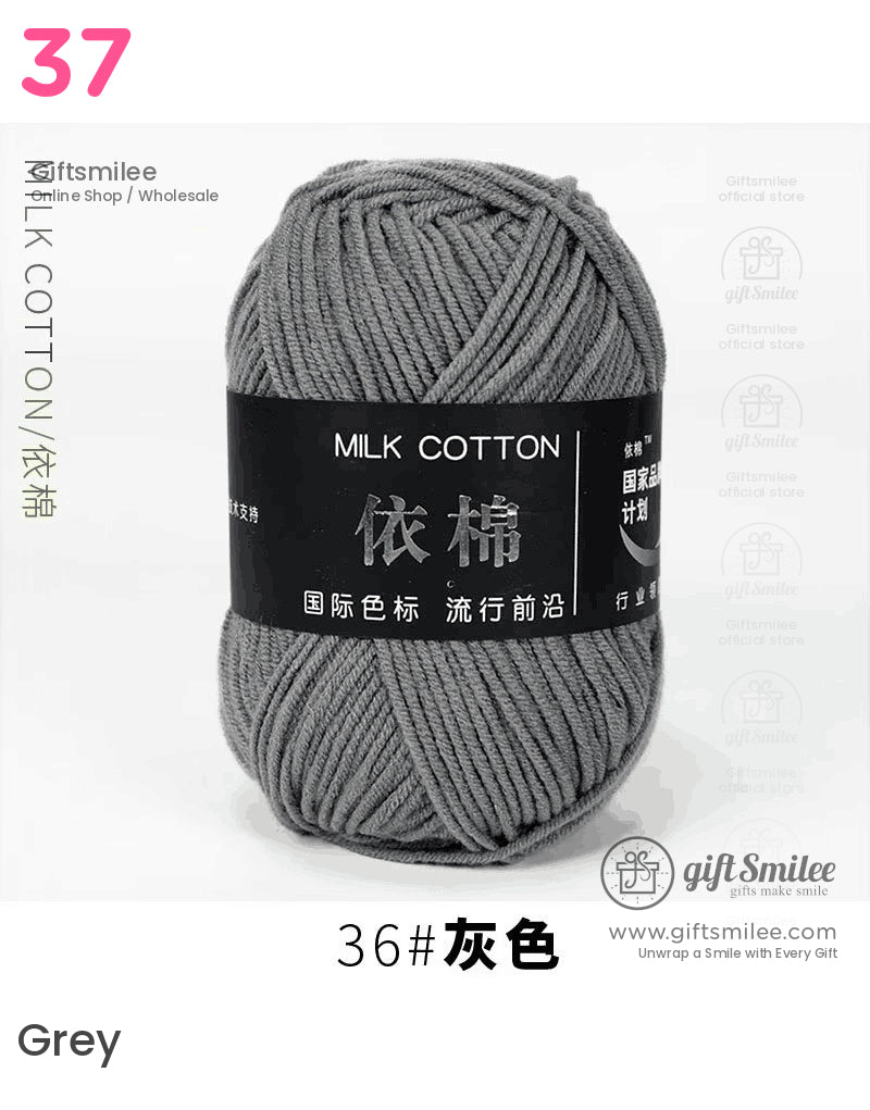 Soft gray milk cotton yarn ball with a smooth texture ideal for knitting and crochet projects labeled in black