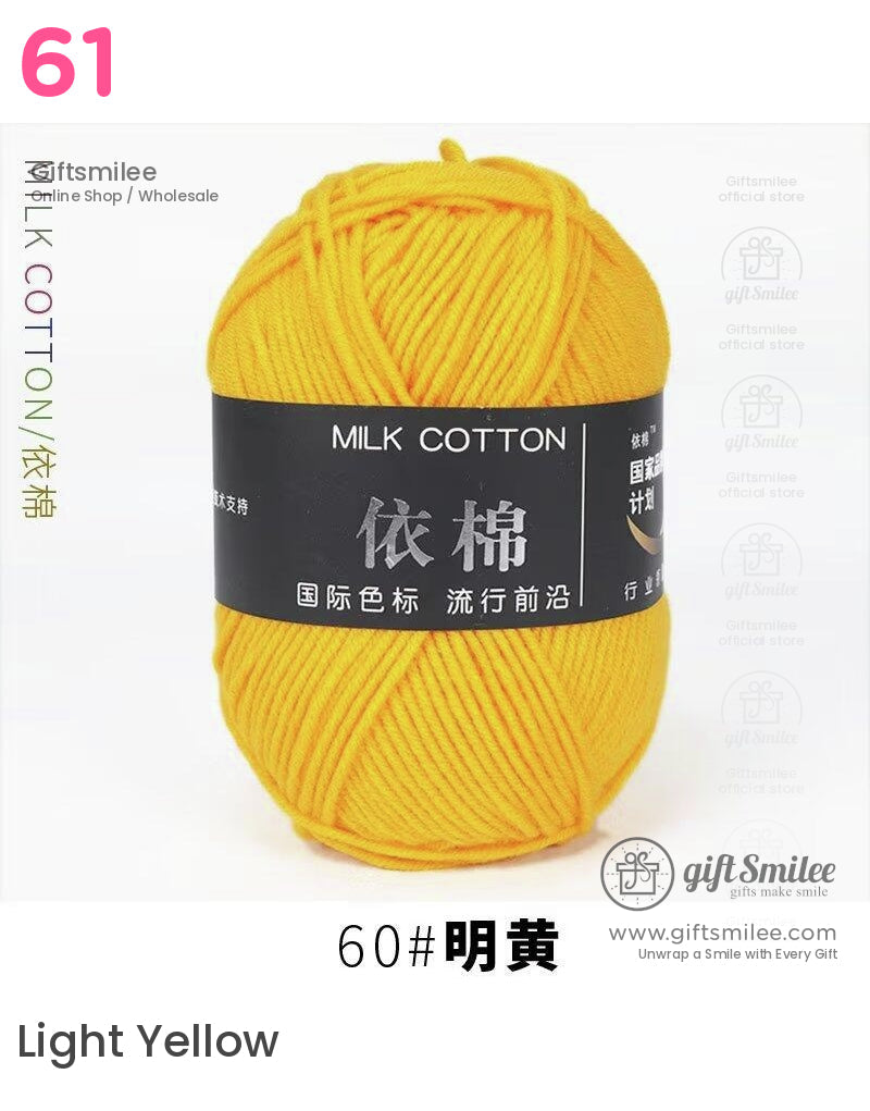 Bright yellow milk cotton yarn with smooth texture soft fiber and black label featuring white text and design accents