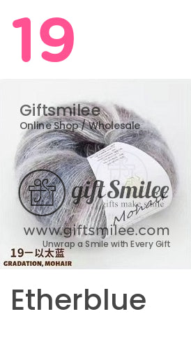 Soft gray and lavender gradient mohair yarn skein with a silky texture ideal for knitting and crochet projects