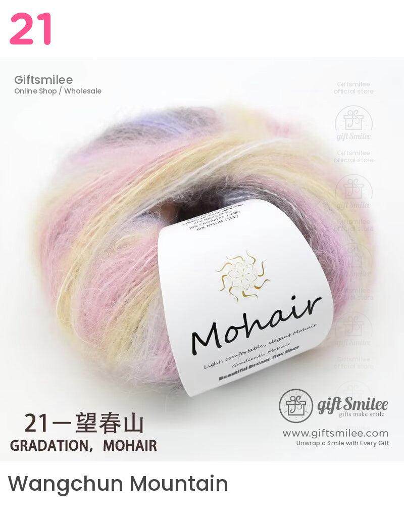 Pastel gradient mohair yarn in shades of pink yellow and lavender with soft fluffy texture and branded label