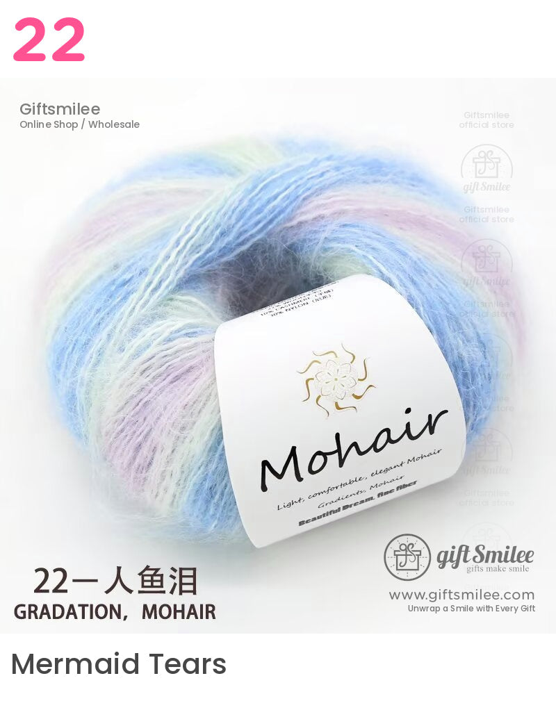 Soft pastel mohair yarn in gradient hues of blue lavender and cream featuring a lightweight airy texture