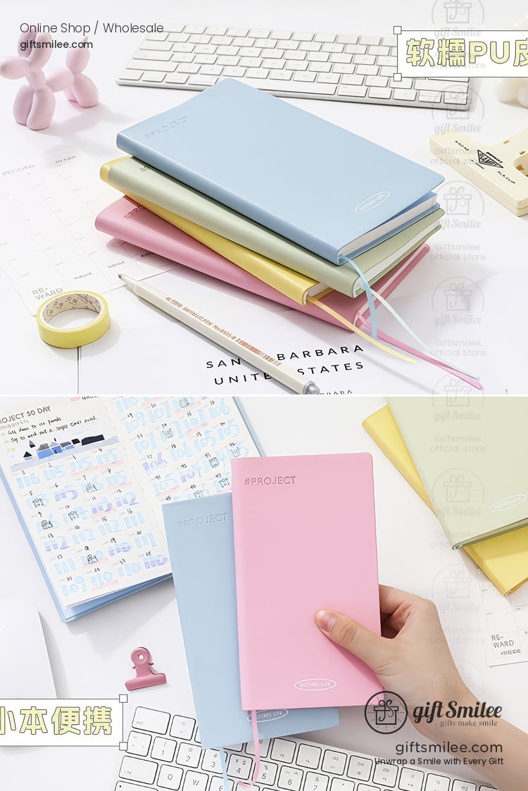 Pastel PU leather notebooks stacked on a desk with stationery, ideal for planners or journaling.