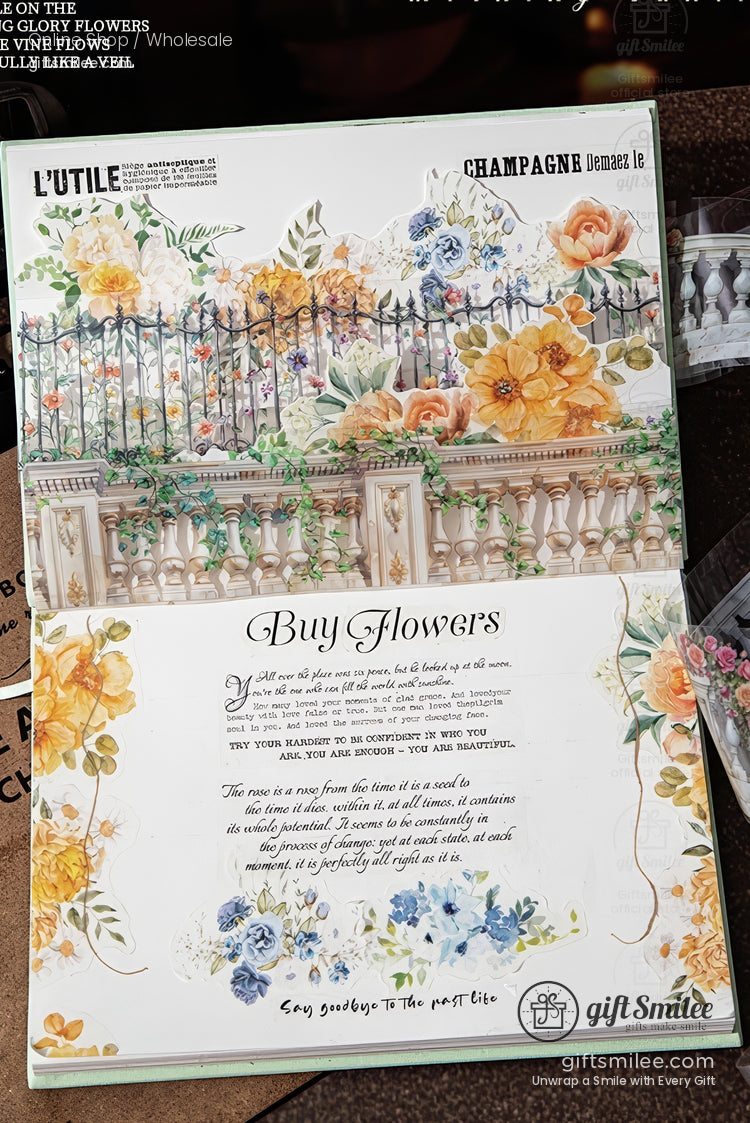 Vintage floral poster with ornate balcony railing, yellow and blue watercolor flowers, and “Buy Flowers” typography on cream background, giftSmile branding.