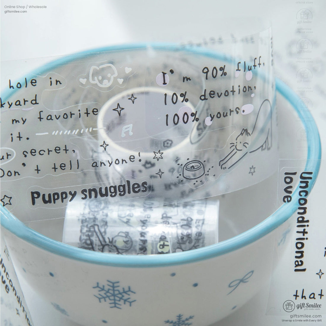Transparent washi tape sheets with minimalist doodles and motivational quotes laid out on a desk with scissors and stationery.