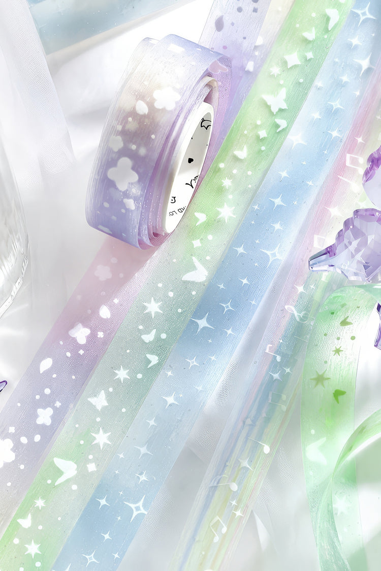Pastel gradient washi tapes in lavender mint and blue adorned with white stars hearts and floral patterns
