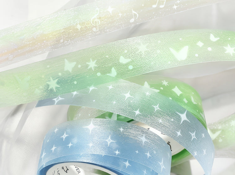 Pastel green and blue translucent washi tapes with butterfly star and music note patterns ideal for crafts