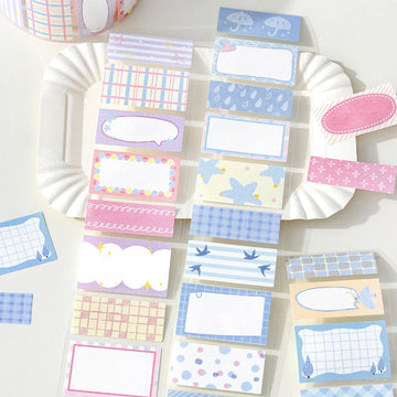 Pastel sticky notes with assorted patterns including plaids polka dots stars umbrellas and decorative frames