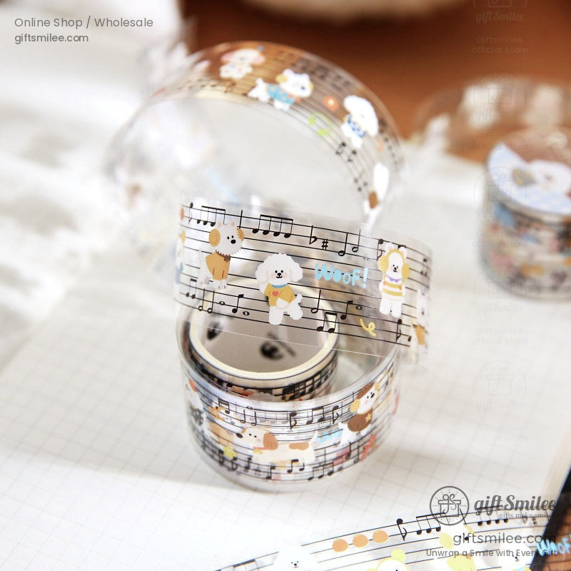 Transparent decorative tape with musical notes cartoon dogs and colorful details ideal for creative crafts