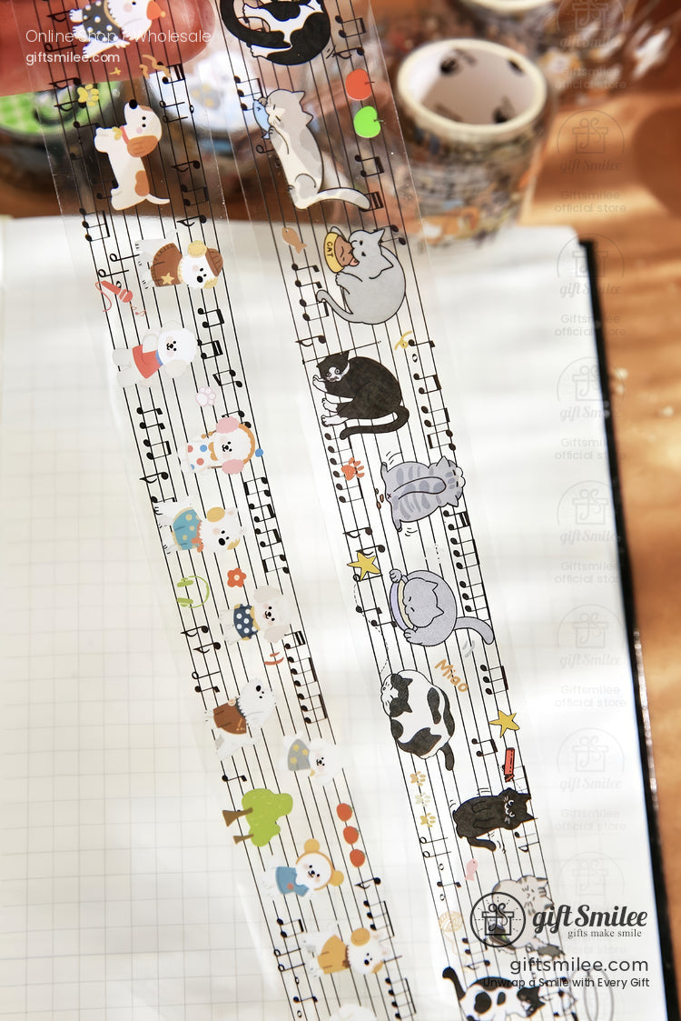 Transparent washi tape with cartoon animals music note design featuring cats dogs and cows in playful poses