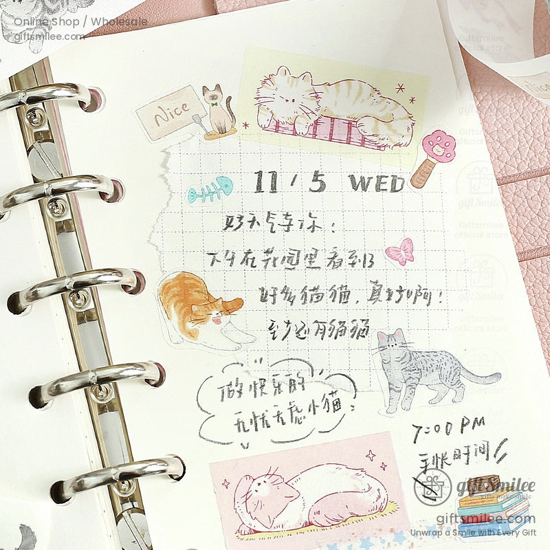 Cute catthemed planner page with pastel stickers grid paper handwritten notes silver rings and pink leather cover