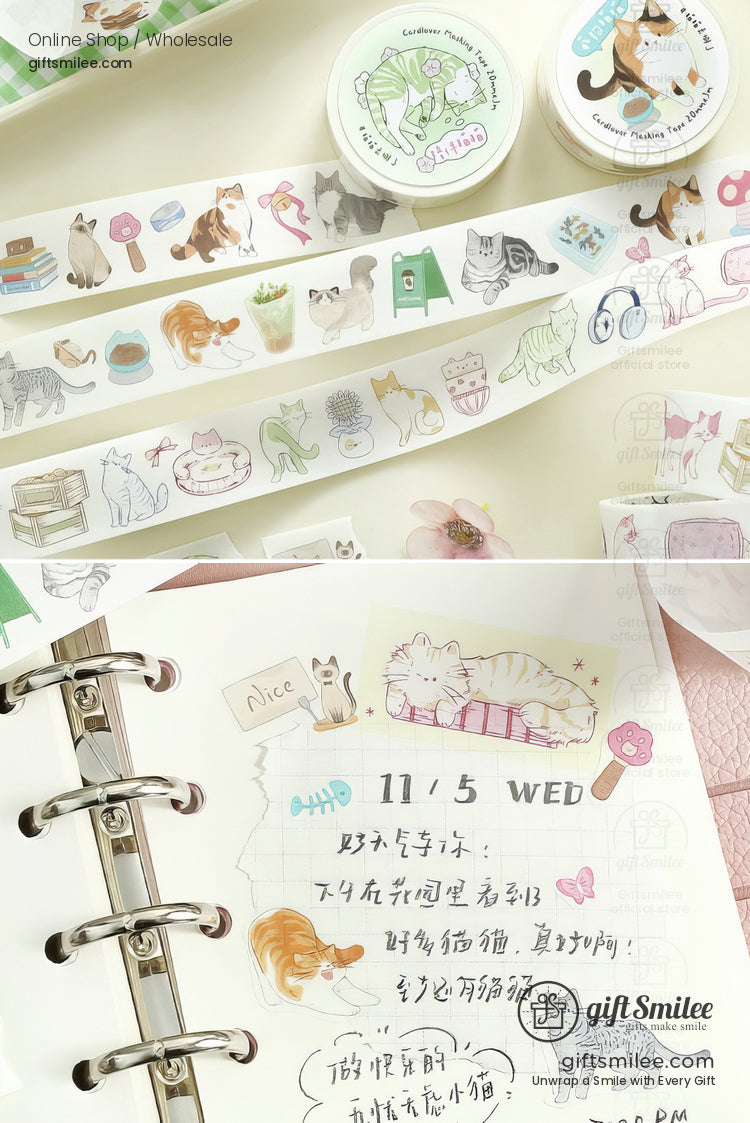 Pastelcolored catthemed washi tape rolls with playful illustrations and a journal decorated with matching stickers