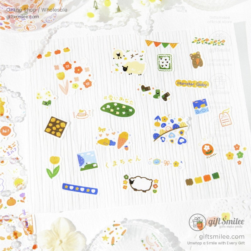 Colorful decorative stickers with playful animal food and nature designs on glossy white rolls and sheets