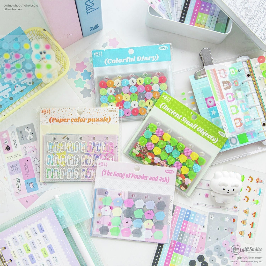 A variety of colorful planner stickers organized in a binder with vibrant designs
