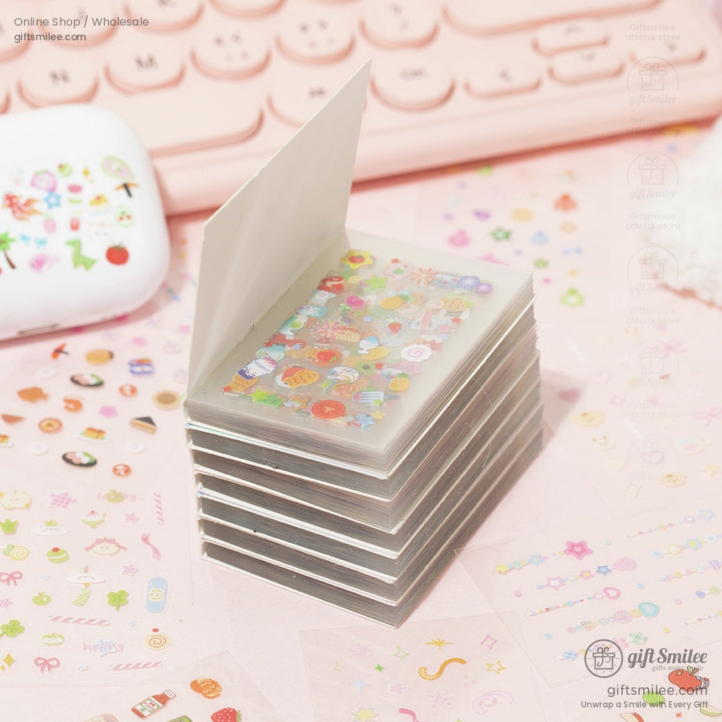 A stack of compact sticker sheets with vibrant designs, perfect for planners and scrapbooking