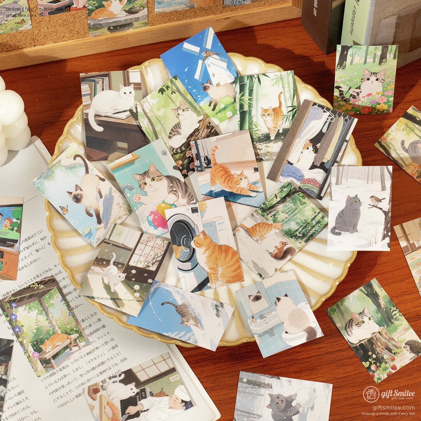 A collection of decorative cat stickers spread on a plate, showcasing playful and serene cat moments