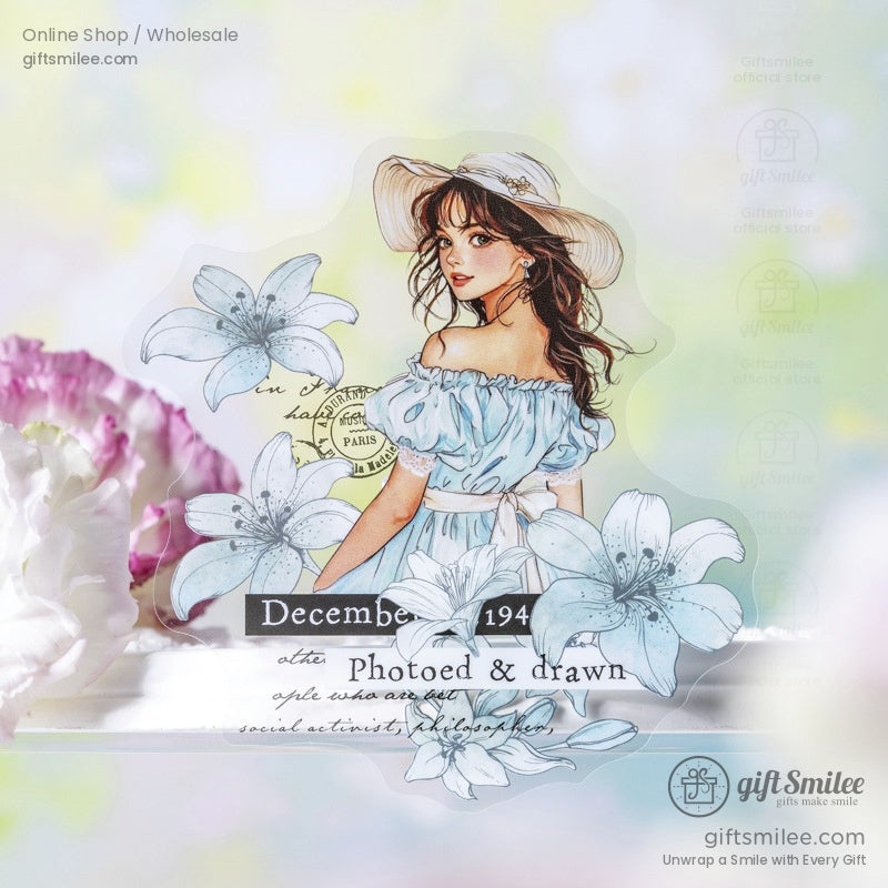 A romantic, vintage-style girl in a blue dress surrounded by delicate white lilies, perfect for scrapbooking and journaling