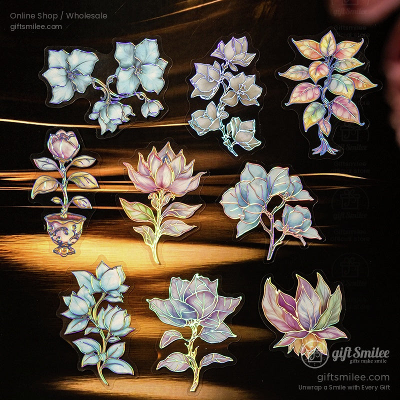Assorted holographic floral stickers with roses, leaves, and delicate flowers on a golden background