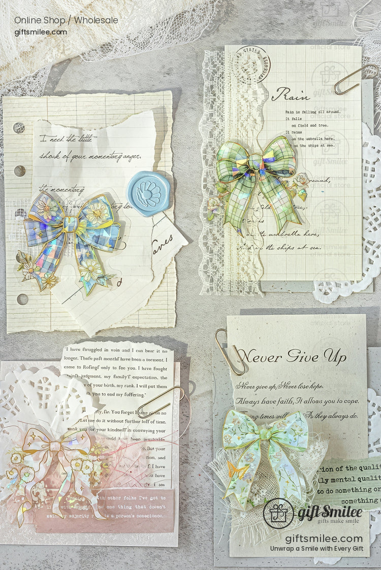 Pastel scrapbook flatlay with four iridescent ribbon bow stickers on vintage paper, lace doilies, and wax seal from giftsmilee.com