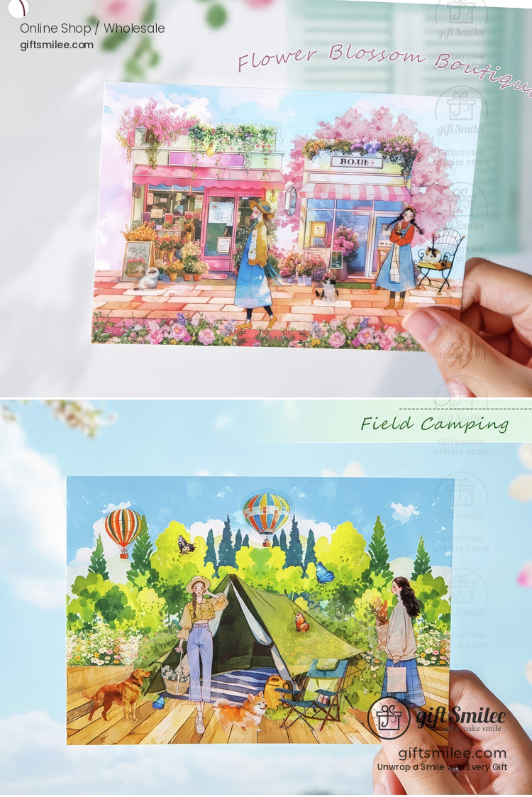 Hand holding colorful postcard illustration of a flower boutique street scene with blooming trees and people shopping – Giftsmilee postcard.