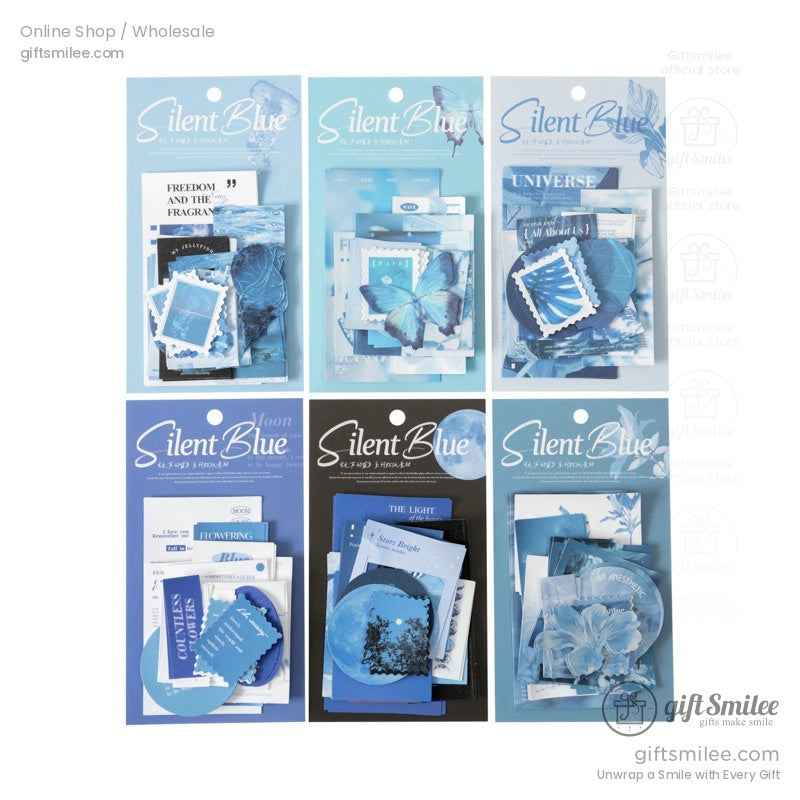 Assorted bluethemed stationery packs with butterfly moon floral and stamp designs in layered paper cutouts