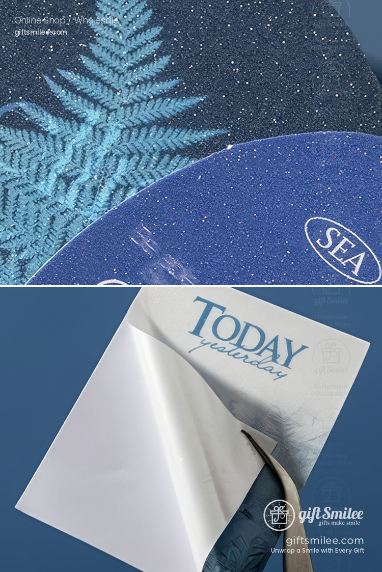Glossy blue stickers with intricate fern print and SEA logo paired with a white TODAY peeloff adhesive sheet