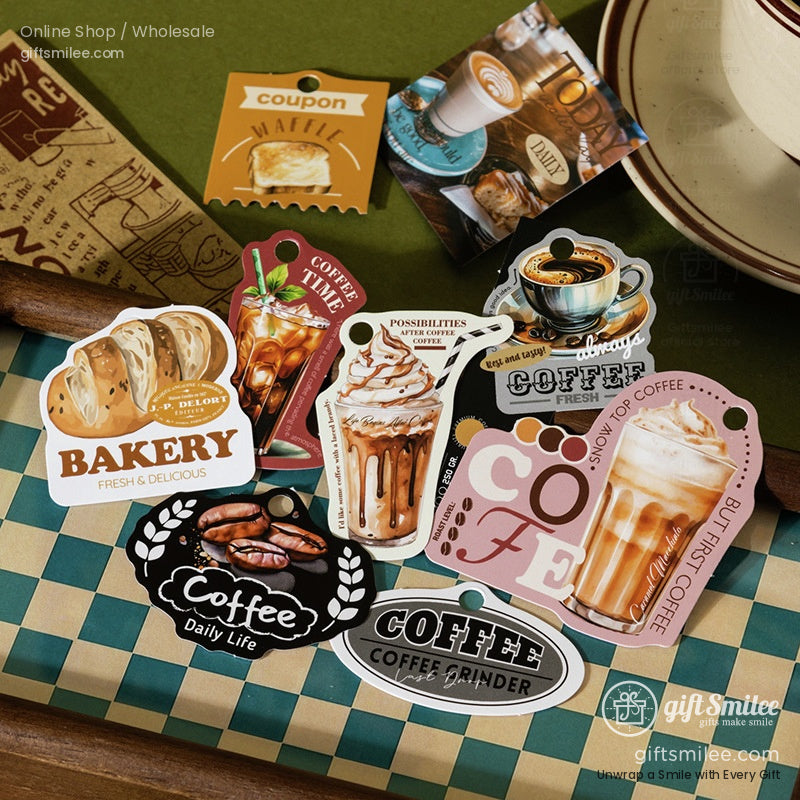 Assorted coffeethemed stickers with vibrant designs featuring drinks pastries beans and typography on a checkered surface