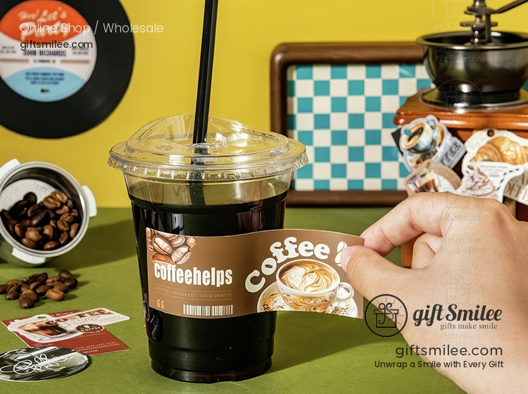 Clear plastic iced coffee cup with a black straw brown coffeethemed sleeve on a green table near vintage decor